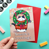 Season's Greetings Cat by Embers and Ink